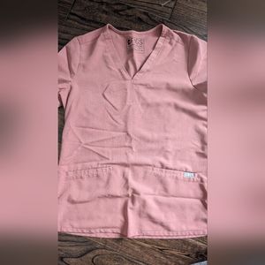 Figs mauve top matches mauve pants with the white string I have in the closet.